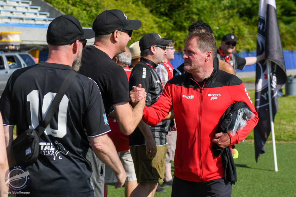 Colin Elmes greets supporters after the game