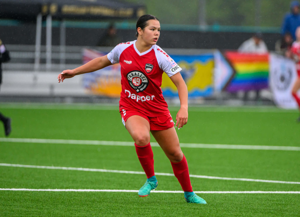 Katie Chan waits for the ball