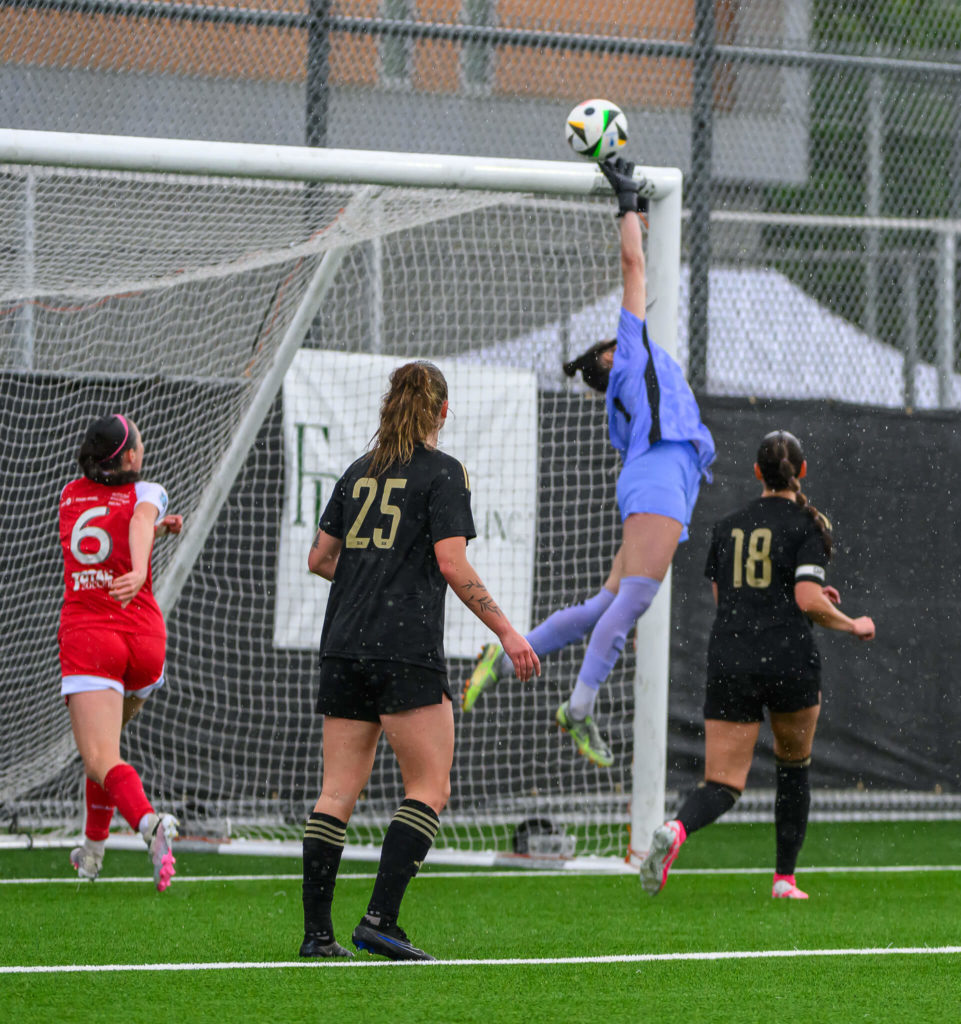 Kirstin Tynan leaps to make a save